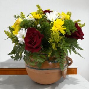 flower arrangement in clay pot